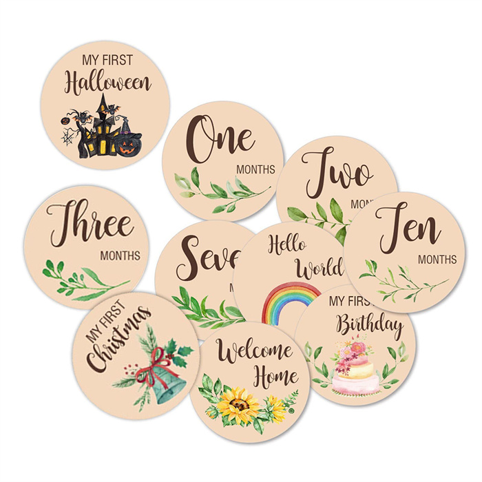 Round wooden printed baby milestones.jpg